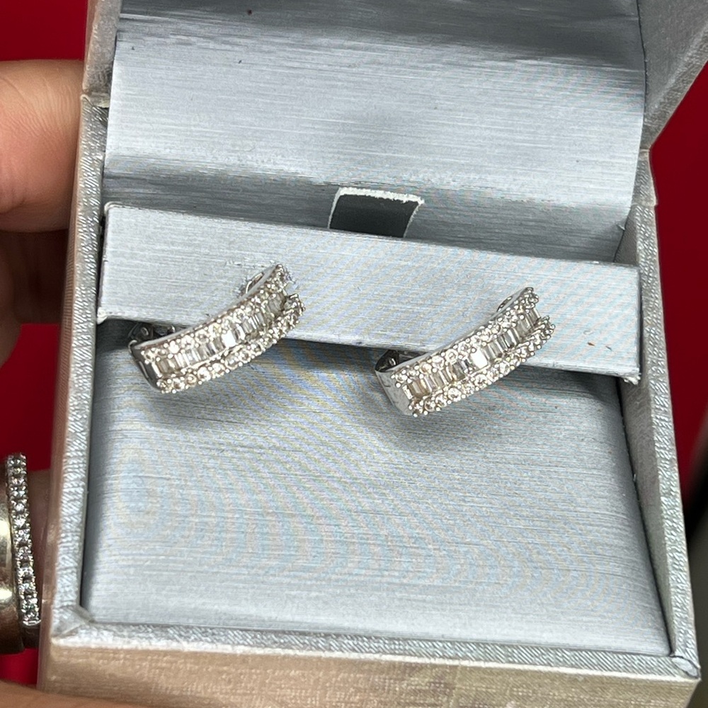 Diamond hoops in white gold.